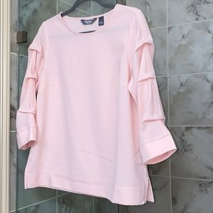 Beautiful light pink blouse with sleeve detail